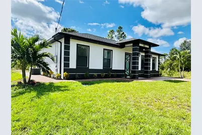 302 E 15th St, Lehigh Acres, FL 33972 - Photo 1