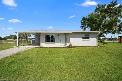 211 E Jasmine Rd, Lehigh Acres, FL 33936 - Photo 1