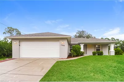 1057 Lilac St E, Lehigh Acres, FL 33974 - Photo 1