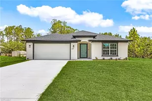 365 Woodburn Dr, Lehigh Acres, FL 33972 - Photo 1