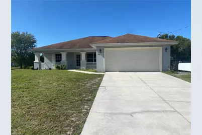 668 Homestead Rd S, Lehigh Acres, FL 33974 - Photo 1