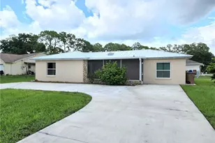 100 Roosevelt Ave, Lehigh Acres, FL 33936 - Photo 1