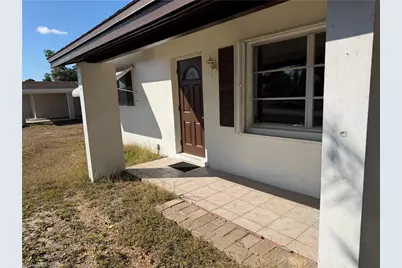 303 Canyon Dr N, Lehigh Acres, FL 33936 - Photo 1