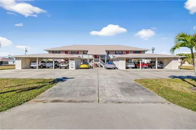 1303 SW 16th Ter #101, Cape Coral, FL 33991 - Photo 1