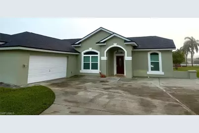 545 Whispering Wind Bend, Lehigh Acres, FL 33974 - Photo 1