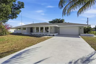 113 E Lake Dr, Lehigh Acres, FL 33936 - Photo 1