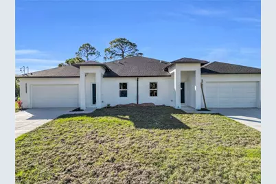 218 Homer Ave S, Lehigh Acres, FL 33973 - Photo 1