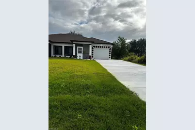 719 Harry Ave S, Lehigh Acres, FL 33973 - Photo 1
