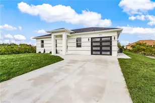 706 Theodore Vail St E, Lehigh Acres, FL 33974 - Photo 1