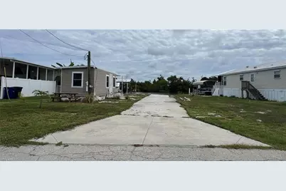 3900 Royal Palm Dr, Saint James City, FL 33956 - Photo 1