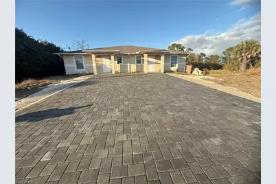 218 W 12th St, Lehigh Acres, FL 33972 - Photo 1