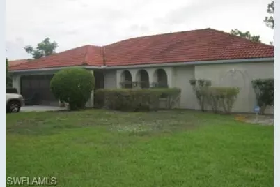100 Sebring Cir, Lehigh Acres, FL 33936 - Photo 1