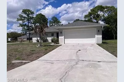 1107 Enrique St E, Lehigh Acres, FL 33974 - Photo 1