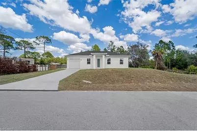 105 E 9th St, Lehigh Acres, FL 33972 - Photo 1