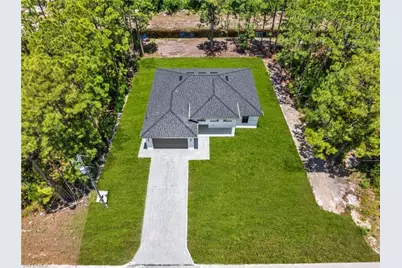 507 Trinity St E, Lehigh Acres, FL 33974 - Photo 1