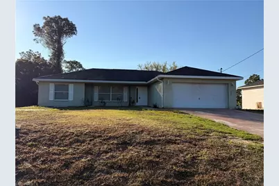 1040 Grant Blvd, Lehigh Acres, FL 33974 - Photo 1
