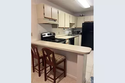 4513 SW 8th Ct #109, Cape Coral, FL 33914 - Photo 1