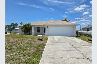 1912 Sunshine Blvd S, Lehigh Acres, FL 33976 - Photo 1