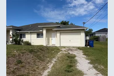 704 Gilbert Ave S, Lehigh Acres, FL 33973 - Photo 1