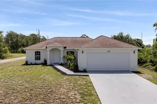 104 Denis Ave N, Lehigh Acres, FL 33971 - Photo 1