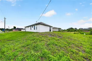 3219 65th St W, Lehigh Acres, FL 33971 - Photo 1