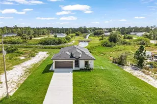 844 Millpond St E, Lehigh Acres, FL 33974 - Photo 1