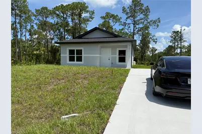 4103 E 13th St, Lehigh Acres, FL 33972 - Photo 1