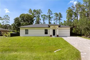 1055 Asther St E, Lehigh Acres, FL 33974 - Photo 1