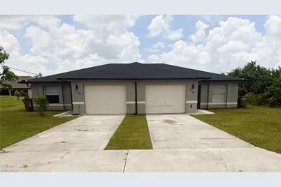 1129/1131 Ivan Ave S, Lehigh Acres, FL 33973 - Photo 1