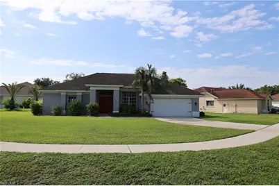 563 Chamonix Ave S, Lehigh Acres, FL 33974 - Photo 1