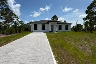 932 Dempsey St, Lehigh Acres, FL 33974 - Photo 1