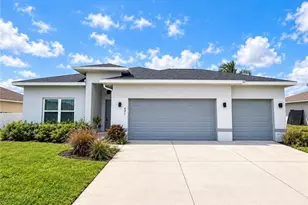 621 NE Juanita Ct, Cape Coral, FL 33909 - Photo 1