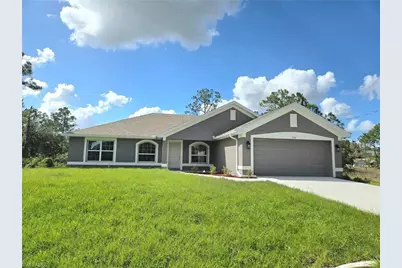 320 Malaga Ave S, Lehigh Acres, FL 33974 - Photo 1