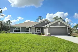 320 Malaga Ave S, Lehigh Acres, FL 33974 - Photo 1