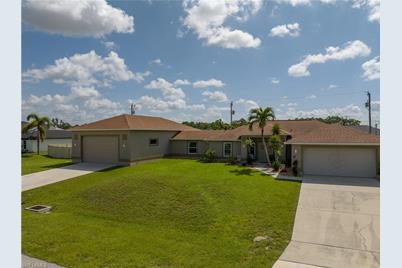 11 NW 13th Pl, Cape Coral, FL 33993 - Photo 1