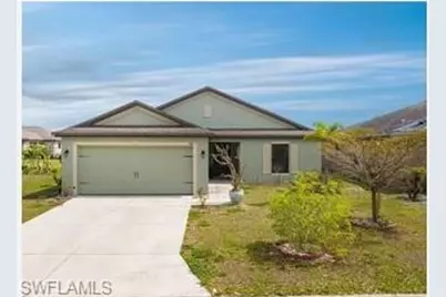 747 Center Lake St, Lehigh Acres, FL 33974 - Photo 1