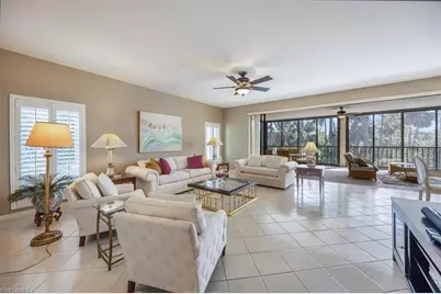 764 Eagle Creek Dr #201, Naples, FL 34113 - Photo 1