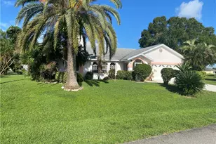 542 Whispering Wind Bend, Lehigh Acres, FL 33974 - Photo 1