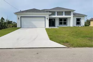 734 Chapman Ave S, Lehigh Acres, FL 33974 - Photo 1