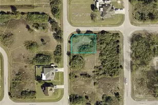 415 Chamonix Ave S, Lehigh Acres, FL 33974 - Photo 1