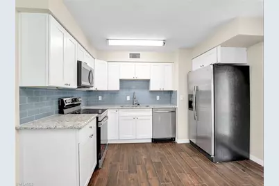 3 Knights Bridge Rd #A2, Naples, FL 34112 - Photo 1