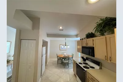 440 Wiggins Lake Ct #201, Naples, FL 34110 - Photo 1