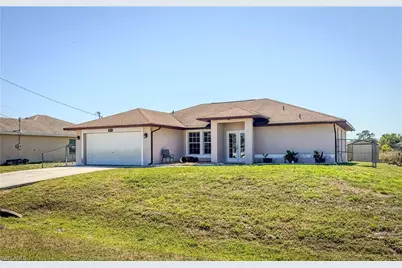 3911 9th St SW, Lehigh Acres, FL 33976 - Photo 1