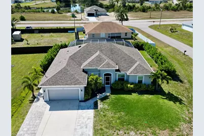 818 NE 38th St, Cape Coral, FL 33909 - Photo 1