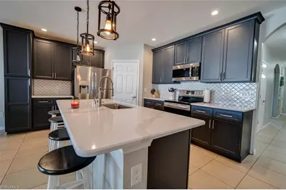 607 NW 13th St, Cape Coral, FL 33993 - Photo 1