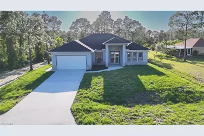 677 Delmonico St, Lehigh Acres, FL 33974 - Photo 1