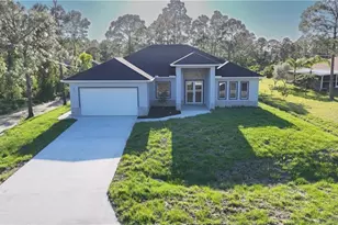 677 Delmonico St, Lehigh Acres, FL 33974 - Photo 1