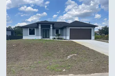 2710 10th St SW, Lehigh Acres, FL 33976 - Photo 1