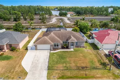 1227 Damen St E, Lehigh Acres, FL 33974 - Photo 1