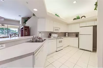 23810 Marbella Bay Rd #202, Estero, FL 34135 - Photo 1